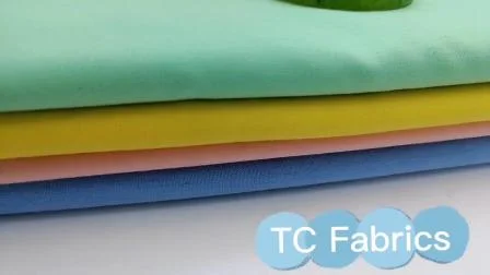 Couleur unie 90 % polyester 10 % coton TC tissu de poche pour chemise uniforme scolaire